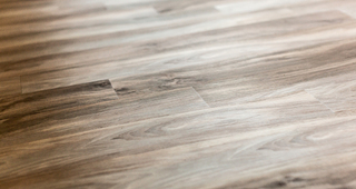 Natural wood-style flooring in warm tones